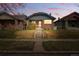 Charming brick home with a well-maintained front yard and a welcoming entrance at 618 Adams St, Denver, CO 80206