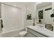 Clean bathroom with a bathtub and updated vanity at 6531 13Th St, Frederick, CO 80530