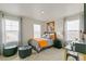 Secondary bedroom with a desk and comfortable seating at 6531 13Th St, Frederick, CO 80530