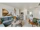 Open loft featuring a sitting area and views to another room at 6531 13Th St, Frederick, CO 80530
