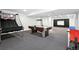 Basement featuring a basketball game, an air hockey table, and other items for entertaining at 7527 E Severn Pl, Denver, CO 80230