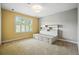 Bedroom featuring a platform bed with storage drawers and built-in shelving at 7527 E Severn Pl, Denver, CO 80230