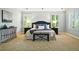 Serene main bedroom features carpet, plantation shutters, and stylish decor at 7527 E Severn Pl, Denver, CO 80230