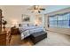 Comfortable bedroom with a queen-sized bed, neutral carpet, and a window at 6172 S Salida Ct, Aurora, CO 80016