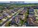Aerial view of a home near Black Bear Golf Club, set in a neighborhood with well-kept lawns and mature trees at 22198 Boundstone Dr, Parker, CO 80138