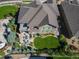 Aerial view of property showcasing lush landscaping and outdoor living at 22198 Boundstone Dr, Parker, CO 80138