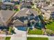 Aerial view of large suburban home with meticulously maintained landscaping at 22198 Boundstone Dr, Parker, CO 80138