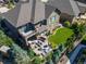 Aerial view of a patio, yard, and upper balcony at 22198 Boundstone Dr, Parker, CO 80138