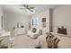 Bright bedroom with neutral tones, a ceiling fan, and stylish decor for a cozy, modern feel at 22198 Boundstone Dr, Parker, CO 80138