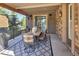 Covered patio featuring dining table and chairs at 22198 Boundstone Dr, Parker, CO 80138