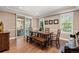 Elegant dining room with hardwood floors and sliding glass doors at 22198 Boundstone Dr, Parker, CO 80138
