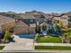 Beautiful home exterior with manicured lawn and mature trees at 22198 Boundstone Dr, Parker, CO 80138