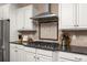 Modern kitchen with stainless steel appliances and a stylish backsplash at 22198 Boundstone Dr, Parker, CO 80138