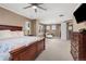Large main bedroom has a ceiling fan, neutral carpet and paint, and big windows at 22198 Boundstone Dr, Parker, CO 80138