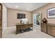 Bright home office with a large window and custom shelving at 22198 Boundstone Dr, Parker, CO 80138