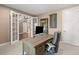 Spacious home office with French doors and ample natural light at 22198 Boundstone Dr, Parker, CO 80138