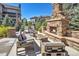 Outdoor patio and fireplace area perfect for entertaining guests at 22198 Boundstone Dr, Parker, CO 80138