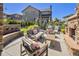 Relaxing outdoor patio with fireplace and comfortable seating at 22198 Boundstone Dr, Parker, CO 80138