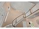 View of the staircase and upper hallway, showcasing architectural details and design at 22198 Boundstone Dr, Parker, CO 80138