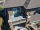 Upper balcony with outdoor seating area at 22198 Boundstone Dr, Parker, CO 80138