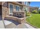 Inviting water feature with stone accents enhances the home's exterior at 22198 Boundstone Dr, Parker, CO 80138