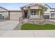 Charming single-Gathering home with stone accents, a well-maintained lawn, and a cozy front porch at 45946 Gentry Ave, Bennett, CO 80102