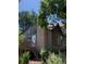 Exterior view of the house highlighting architectural details like the chimney and the elevated deck at 17336 E Rice Cir # F, Aurora, CO 80015