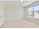 This bedroom features neutral walls, carpet and a large window for lots of natural light at 16283 Olive Way, Brighton, CO 80602