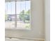 Bright bedroom featuring a large window, allowing natural light to fill the room at 16283 Olive Way, Brighton, CO 80602