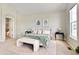 Inviting bedroom features carpet floors, accent furniture, and neutral paint at 16283 Olive Way, Brighton, CO 80602