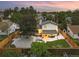 Aerial view of a home featuring a large backyard with a covered patio, wooden deck, and manicured landscaping at 15034 E Floyd Ave, Aurora, CO 80014