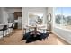 Bright dining space features backyard views and easy access to kitchen and sliding glass door at 5928 N Lisbon St, Aurora, CO 80019