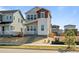 Attractive two-story house boasts a covered porch, complementary siding colors, and convenient yard at 5928 N Lisbon St, Aurora, CO 80019