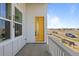 Welcoming front porch showing a yellow door with glass, a modern color scheme, and a new yard at 5928 N Lisbon St, Aurora, CO 80019