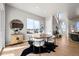 Modern dining room with backyard views, conveniently located near the kitchen and stairs at 5928 N Lisbon St, Aurora, CO 80019