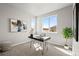 A well-lit office space featuring a sleek desk and modern decor elements at 5928 N Lisbon St, Aurora, CO 80019