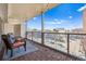 Large balcony with outdoor seating and city views at 888 N Logan St # 5A, Denver, CO 80203