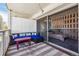 Relaxing balcony with comfortable seating, a colorful rug, and city views at 888 N Logan St # 5A, Denver, CO 80203