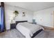 Inviting bedroom with plush carpeting, a comfortable bed, and decorative accents at 888 N Logan St # 5A, Denver, CO 80203