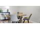 Dining room showcases a round table set, a stylish rug, and modern decor at 888 N Logan St # 5A, Denver, CO 80203