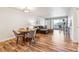 Spacious living room with hardwood floors, comfortable seating and balcony access at 888 N Logan St # 5A, Denver, CO 80203