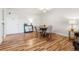 Bright living room featuring beautiful hardwood floors and stylish decor at 888 N Logan St # 5A, Denver, CO 80203