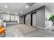 Modern lobby with slate floors, neutral walls, decorative art, and convenient elevator access at 888 N Logan St # 5A, Denver, CO 80203
