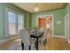 Enjoy meals in the dining room with hardwood floors, decorative ceilings, and neutral colors at 1315 Gaylord St, Denver, CO 80206