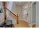 This home features a classic foyer with hardwood floors and a charming staircase at 1315 Gaylord St, Denver, CO 80206
