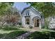 Beautiful home featuring a light exterior and a well-manicured front yard at 1315 Gaylord St, Denver, CO 80206