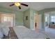 Main bedroom featuring doorways to an adjacent bathroom and sitting area at 1315 Gaylord St, Denver, CO 80206