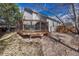 Wooden back deck featuring a seating area perfect for enjoying the outdoors at 12521 S Elk Creek Way, Parker, CO 80134