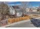 Aerial view of a fenced backyard with a spacious deck, perfect for outdoor entertaining and relaxation at 12521 S Elk Creek Way, Parker, CO 80134