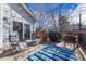 Relaxing deck area with outdoor seating and a grill, perfect for enjoying the outdoors at 12521 S Elk Creek Way, Parker, CO 80134